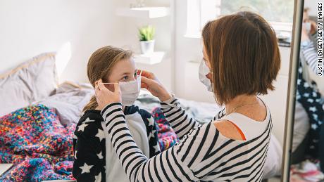 Wearing a mask at home could help stop coronavirus spread among family members, study says 